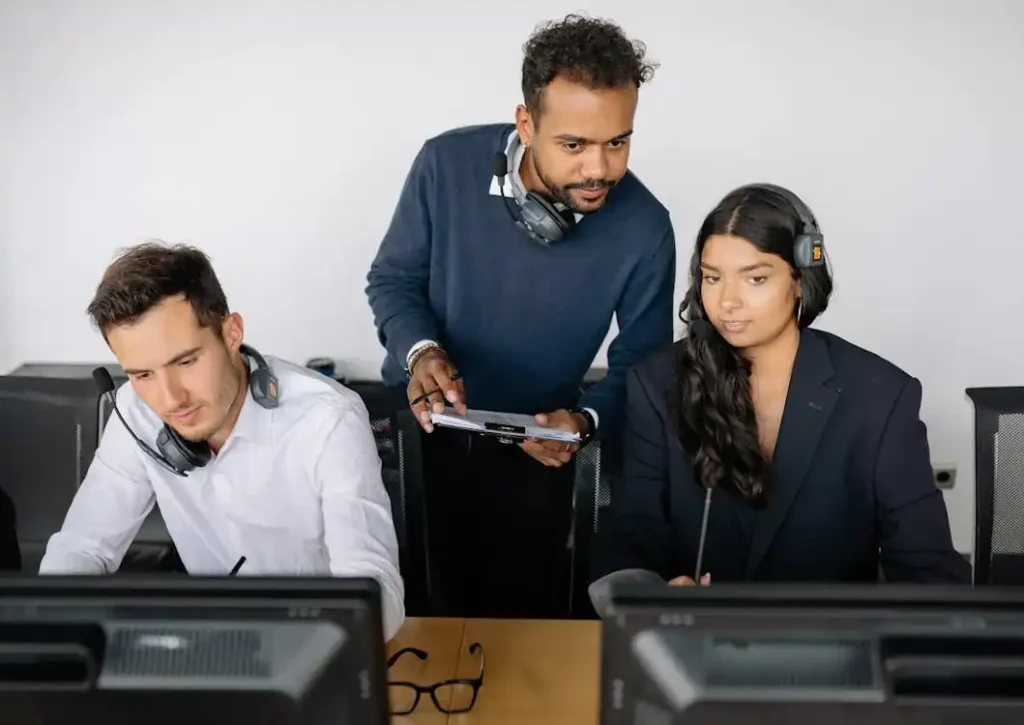 Telemarketing Sales team in strategy meeting
