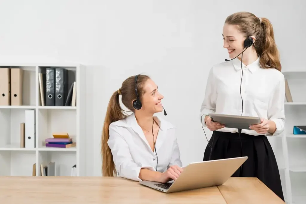 Call center agents discussing sales strategies